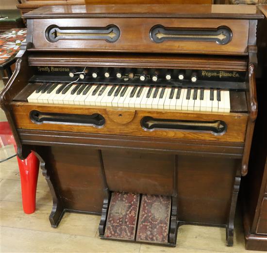 A 19th century American walnut cased cottage organ W.108cm